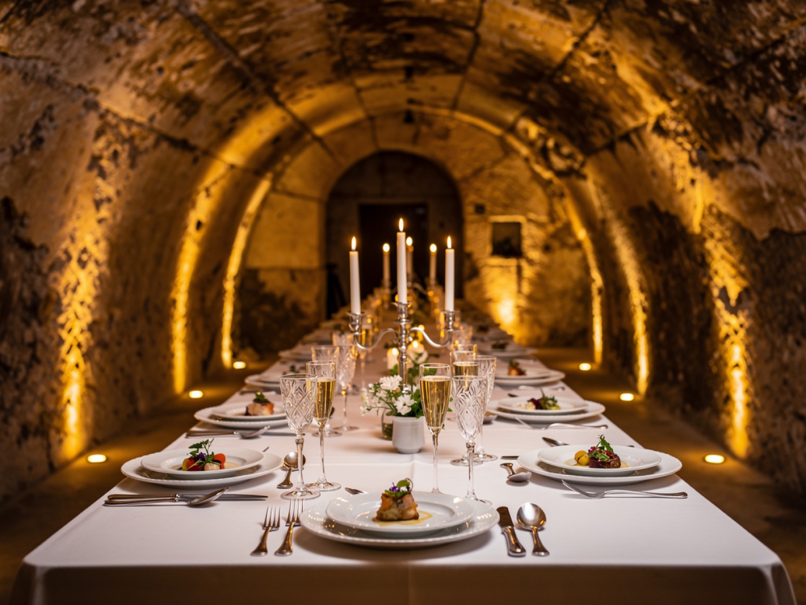 A candlelit table in the chalk cellars